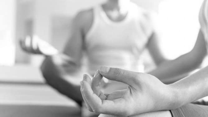 Hands forming a peaceful mudra pose for meditation and mindfulness practice.