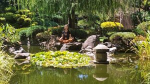 Penelope meditating peacefully at the Japanese Himeji Gardens in Adelaide, South Australia.